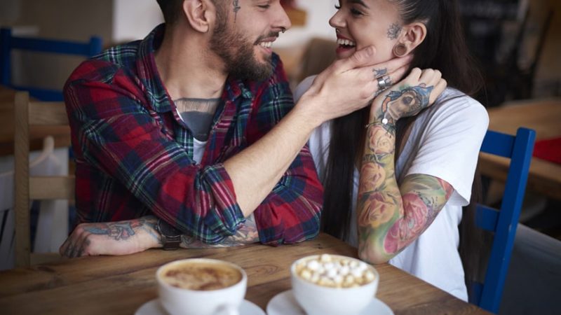 couple-in-coffee-shop-face-to-face-smiling-2024-06-21-19-19-56-utc-min