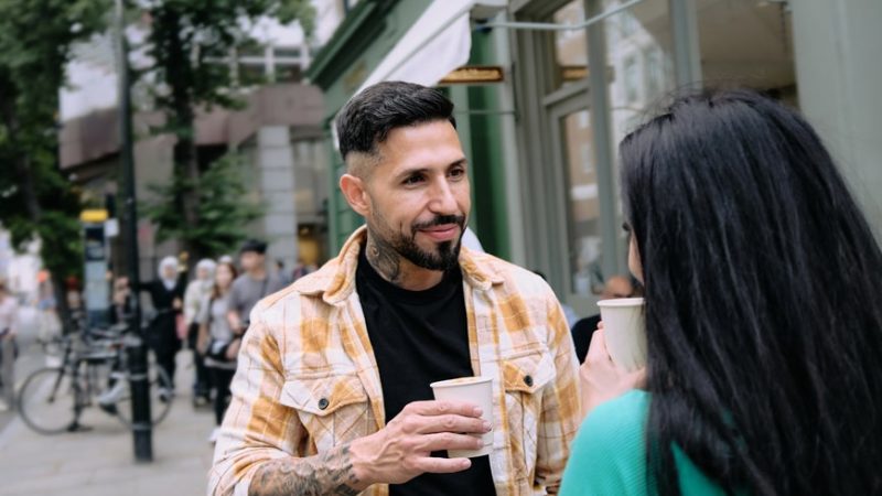 latin-man-and-his-girlfriend-drinking-coffee-2023-11-27-05-18-25-utc-min