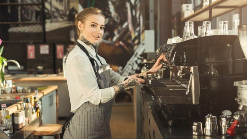 tattooed-barista-making-coffee-in-professional-cof-2023-11-27-05-02-27-utc-min